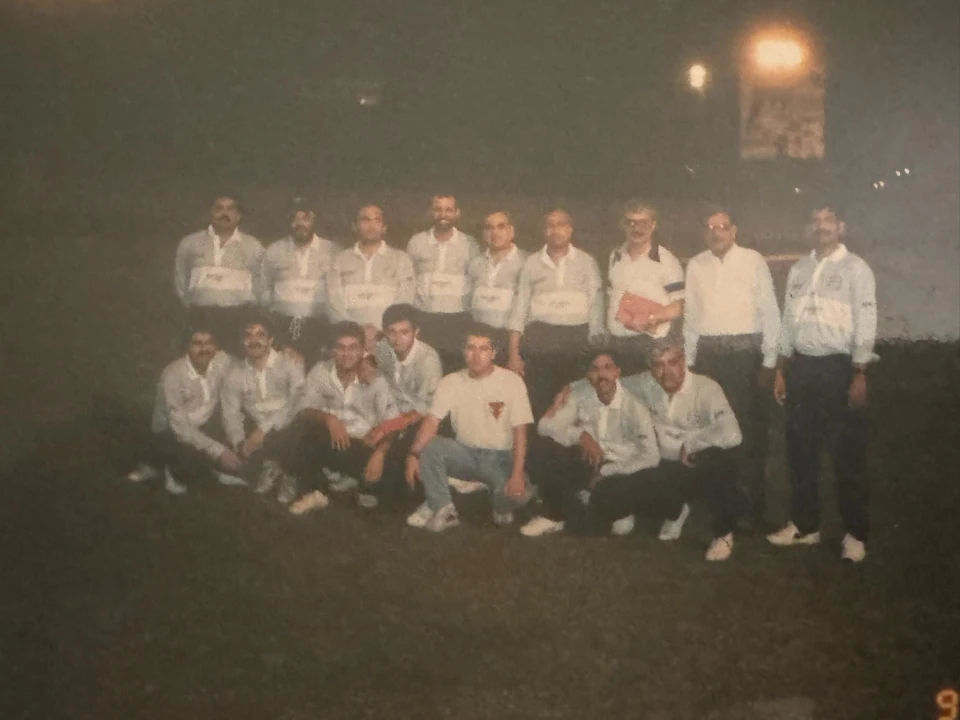 Morad Shaker, age 25, with the Iran national cricket team in 1994; Dr. Zolfaghari stands behind him