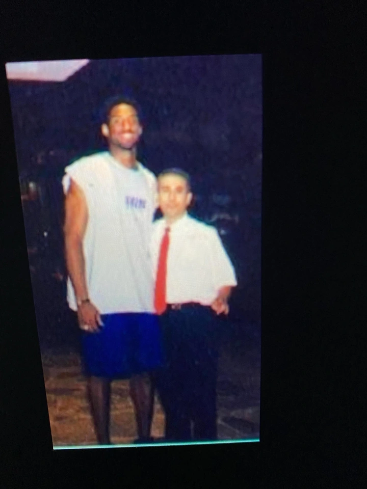 Morad Shaker pictured with a Lakers player in a photograph from his personal archive.