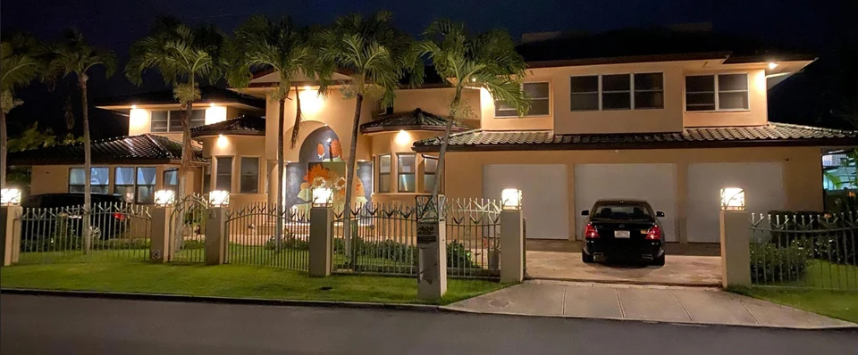 Nighttime front view of Morad Shaker’s home in Portlock, Honolulu